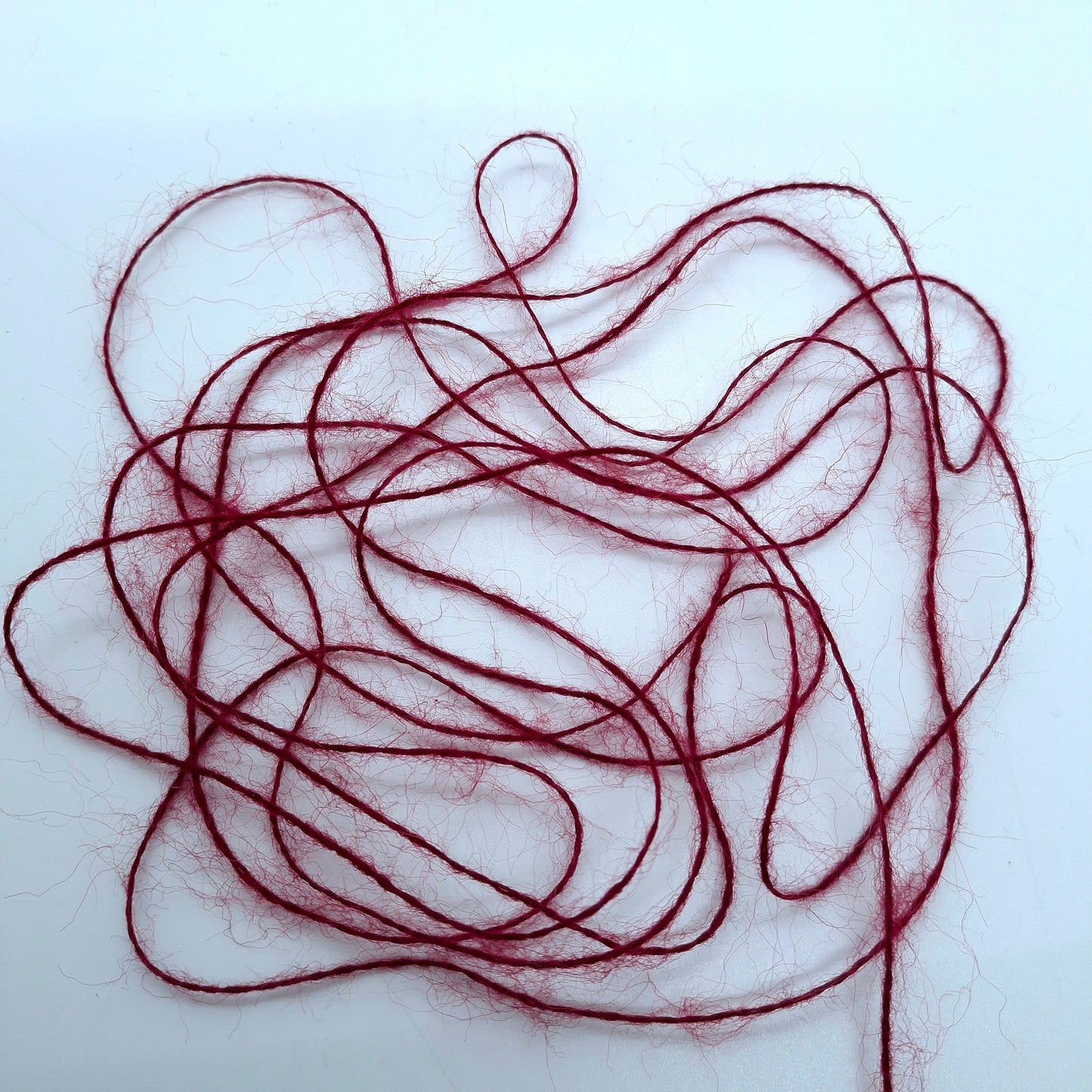 100g blødt mohair garn i italiensk Bordeaux farve nr. 1249