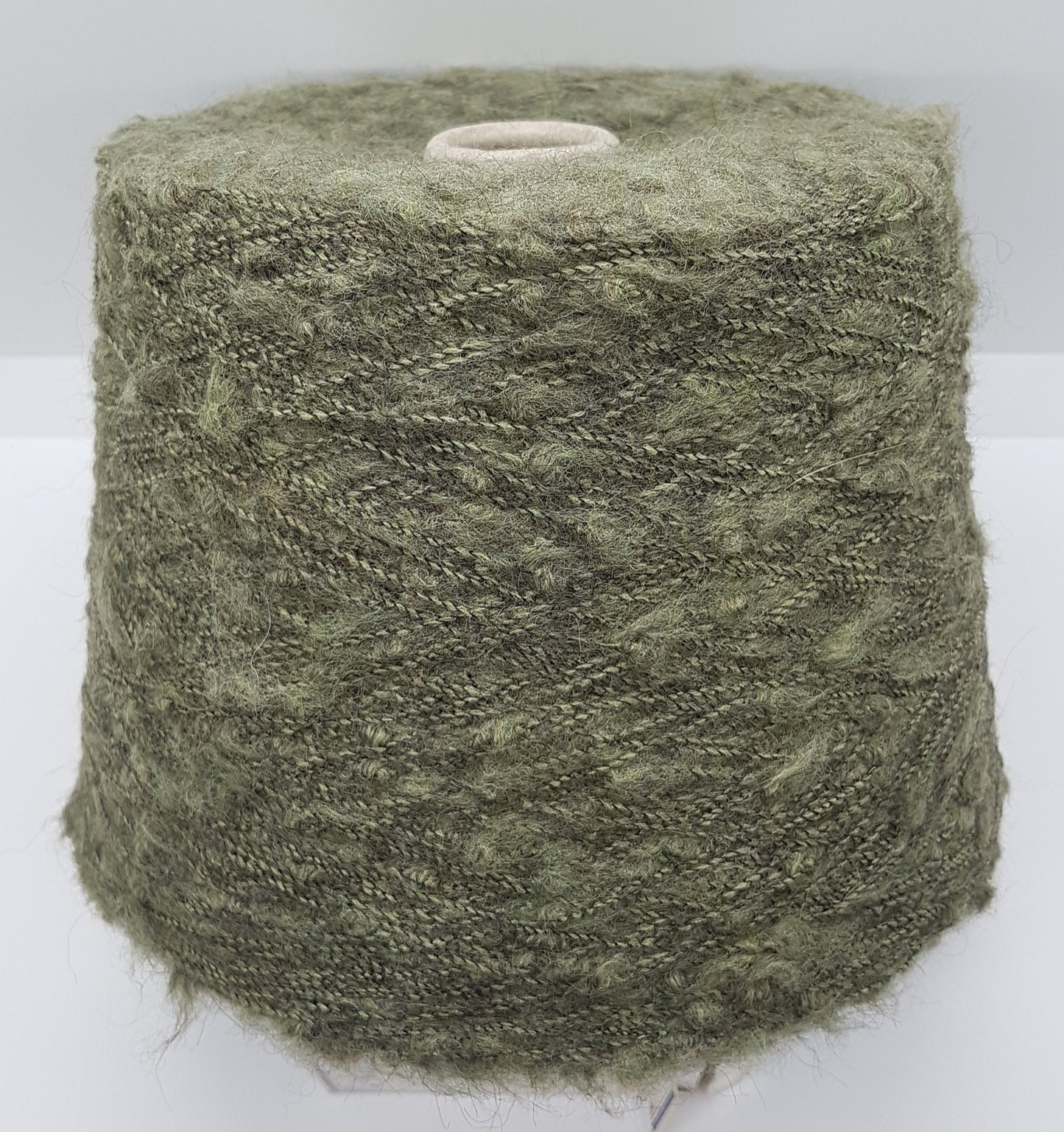 100g de Mohair Irregular Bouclé hilo italiano color verde N.465