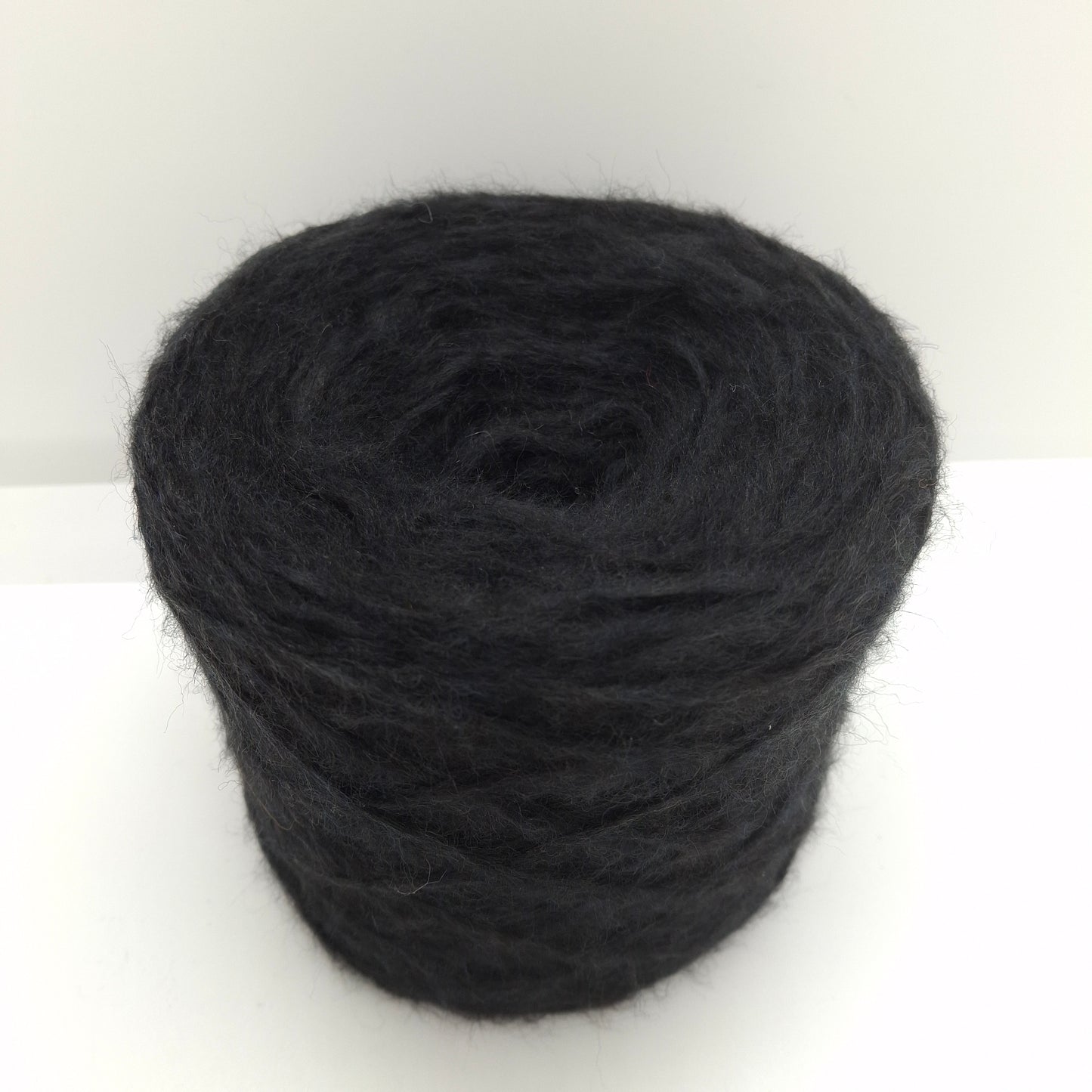 100g Lana Merino filato italiano colore Nero N.1030