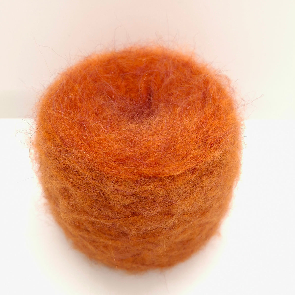 100g de hilo italiano suave de Alpaca cepillada, color óxido N.1360