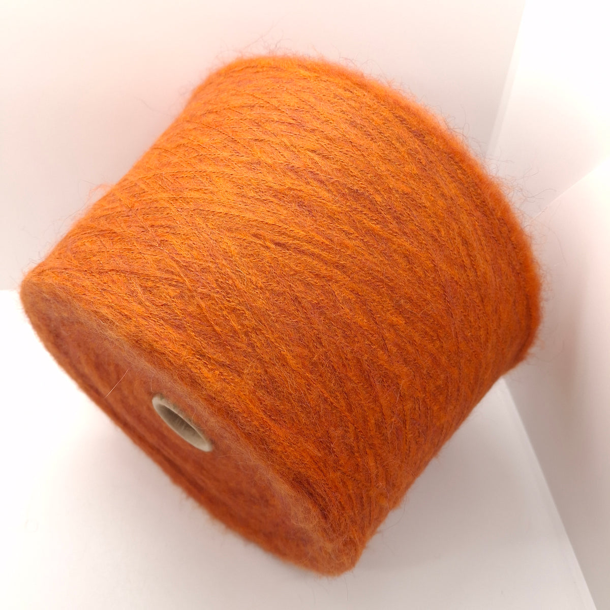 100g de hilo italiano suave de Alpaca cepillada, color óxido N.1360